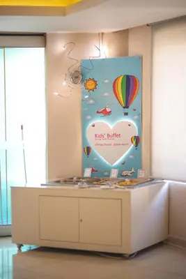 a sign for a heart festival with a hot air balloon at Chrispy Waterpark Resort - All inclusive in Kolymvari