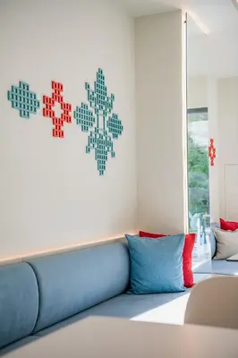 a couch in a room with hearts on the wall at Arkadi Hotel in Chania Town