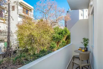 a balcony with a view of a plant at Annet in Chania Town