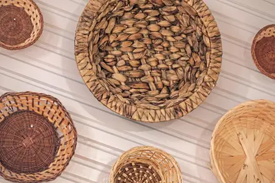 a group of baskets on a wall at KasteliSuites in Chania Town