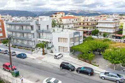 an aerial view of a city with cars parked on the street at Falassarna Hotel in Chania Town