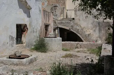 an old building with a hole in the side of it at Evanthea Residence in Kounoupidhianá