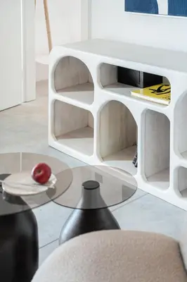 a white coffee table with an apple on a plate at ALS - casa casa group in Chania Town