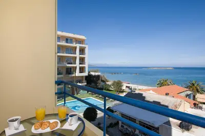 a balcony with a view of the ocean at Be Crete - vista Lazareta in Chania Town