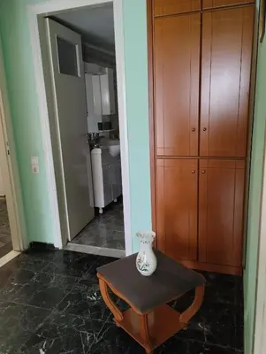 a vase sitting on a table in a room at EMMY APARTMENT in Chania Town