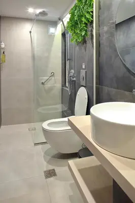 a bathroom with a toilet and a sink and a shower at Mirma Halepa superior studio in Chania Town