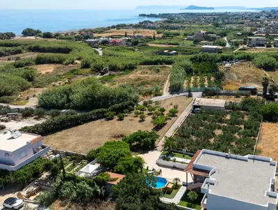 an aerial view of a house and the ocean at Eleni Residence by the sea in Ropanianá