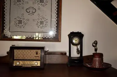 a room with a radio and a clock on a table at Traditional Villa with pool in Sfakia in Ímbros