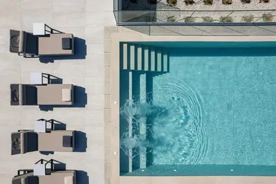 an overhead view of a swimming pool with a fountain at Villa Kafkales Maleme - Heated Pool in Maleme