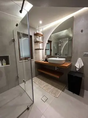 a bathroom with a sink and a shower with a mirror at Villa Recluso-3 bd luxury country villa, huge heated pool with hydromassage, individual bbq & large yard, mountain view in Maláxa
