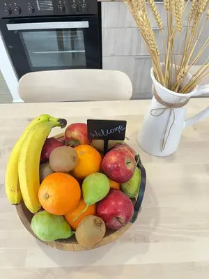 a bowl of fruit sitting on a table at Granny's Nest in Kalyves