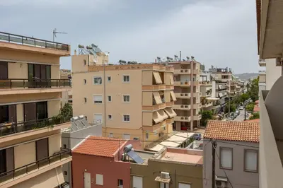 a view of a city with buildings at Nisos apartments, Chania center in Chania Town