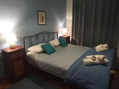 a bedroom with two beds with towels on them at Capt73134 in Chania Town