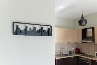 a kitchen with a picture of a city on the wall at Dejaview cozy apartment by 8essentially in Chania Town