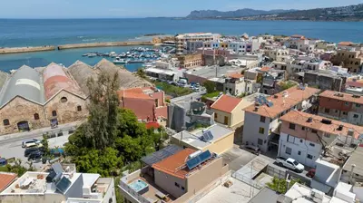 an aerial view of a city with a harbor at Aretousa Studio in Chania Town