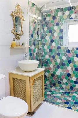 a bathroom with a sink and a shower at Hygge Home Chania in Chania Town