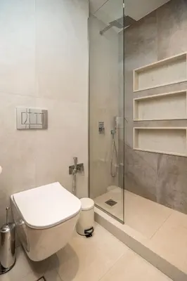a bathroom with a toilet and a shower at Cozy Spot II near the beach in Ayiá